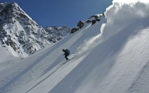 powder skiing from ridge in chile